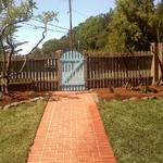 New lawn, mulch, plants and power- washed walkway