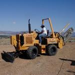 Applicants testing their skills on a trencher